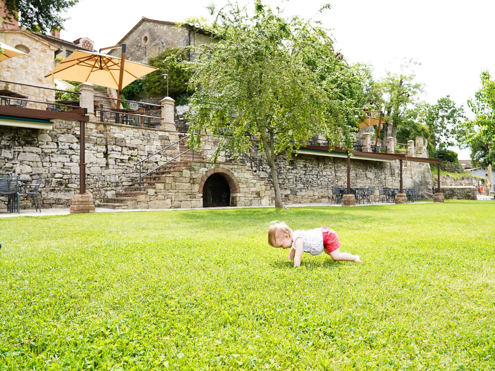 baby crawling borgo pignano - florence tuscany guide with a baby