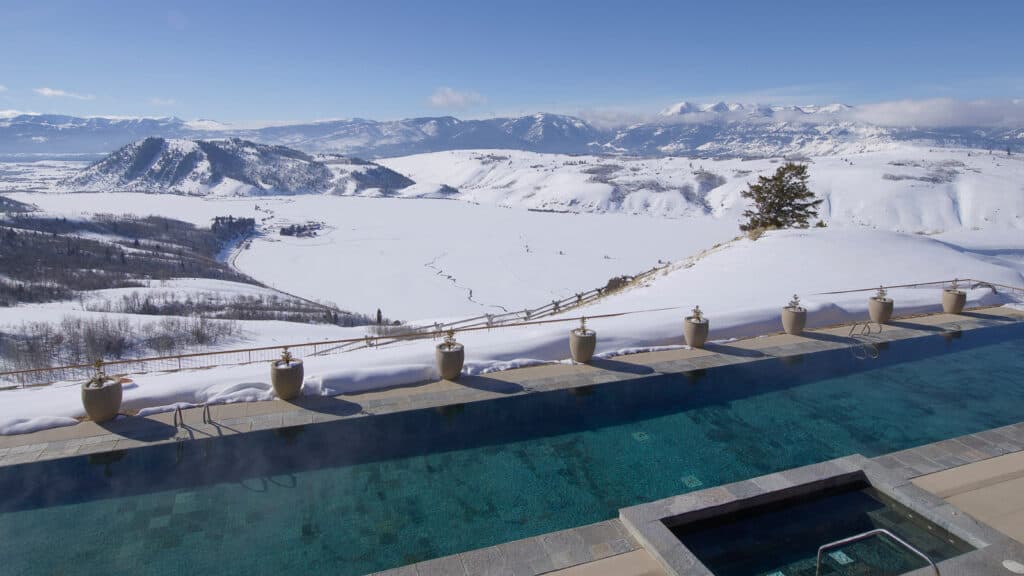 Amangani swimming pool and view of landscape- ultimate family vacation guide to jackson hole