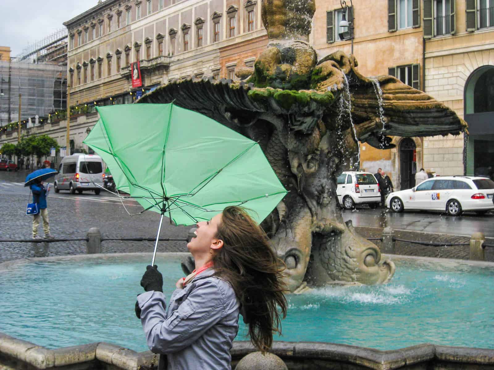 woman in rome with umbrella