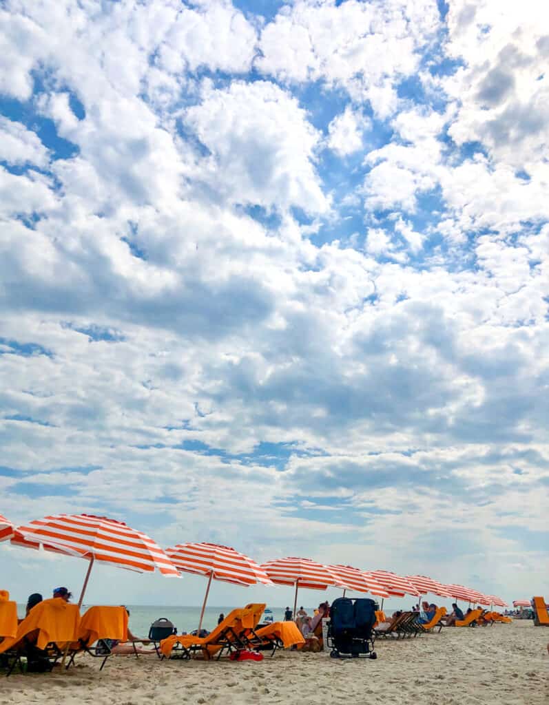 cape may beach with orange umbrellas - compass roam travel blog