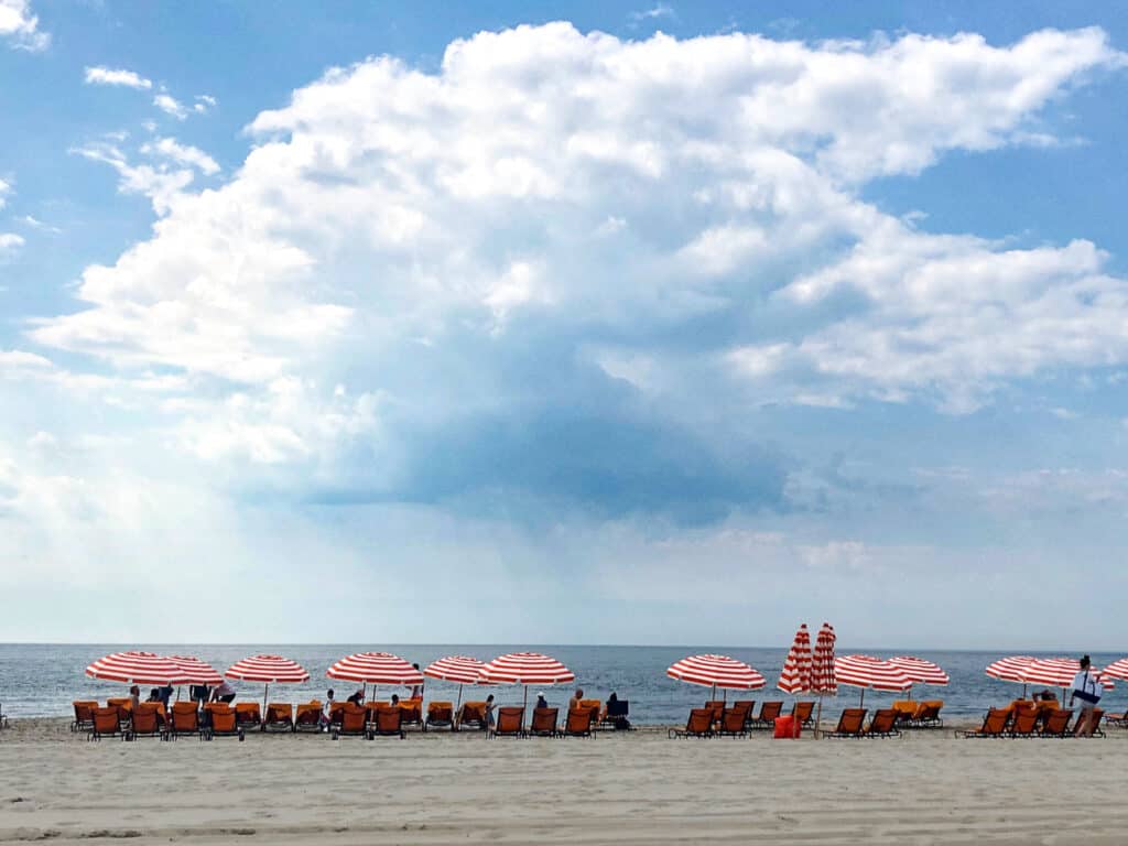 cape may beach with umbrellas. reasons to visit cape may with kids