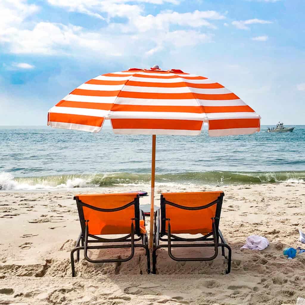 beach chairs on cape may beach - compass roam travel