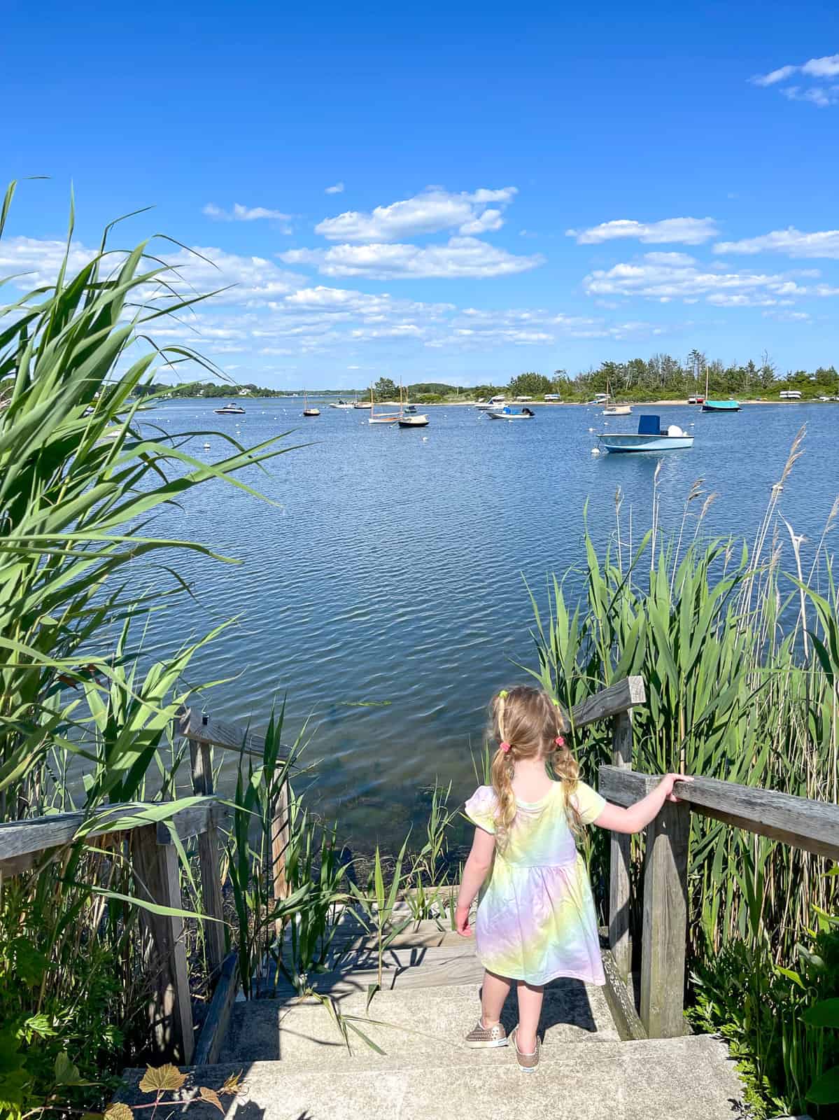 girl exploring marsh - luxury Rhode Island family resort Weekapaug Inn