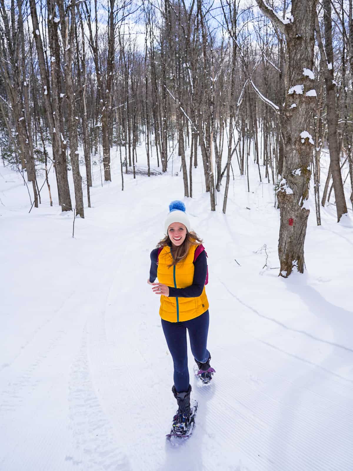 girl running in the snow - romantic Vermont getaway twin farms