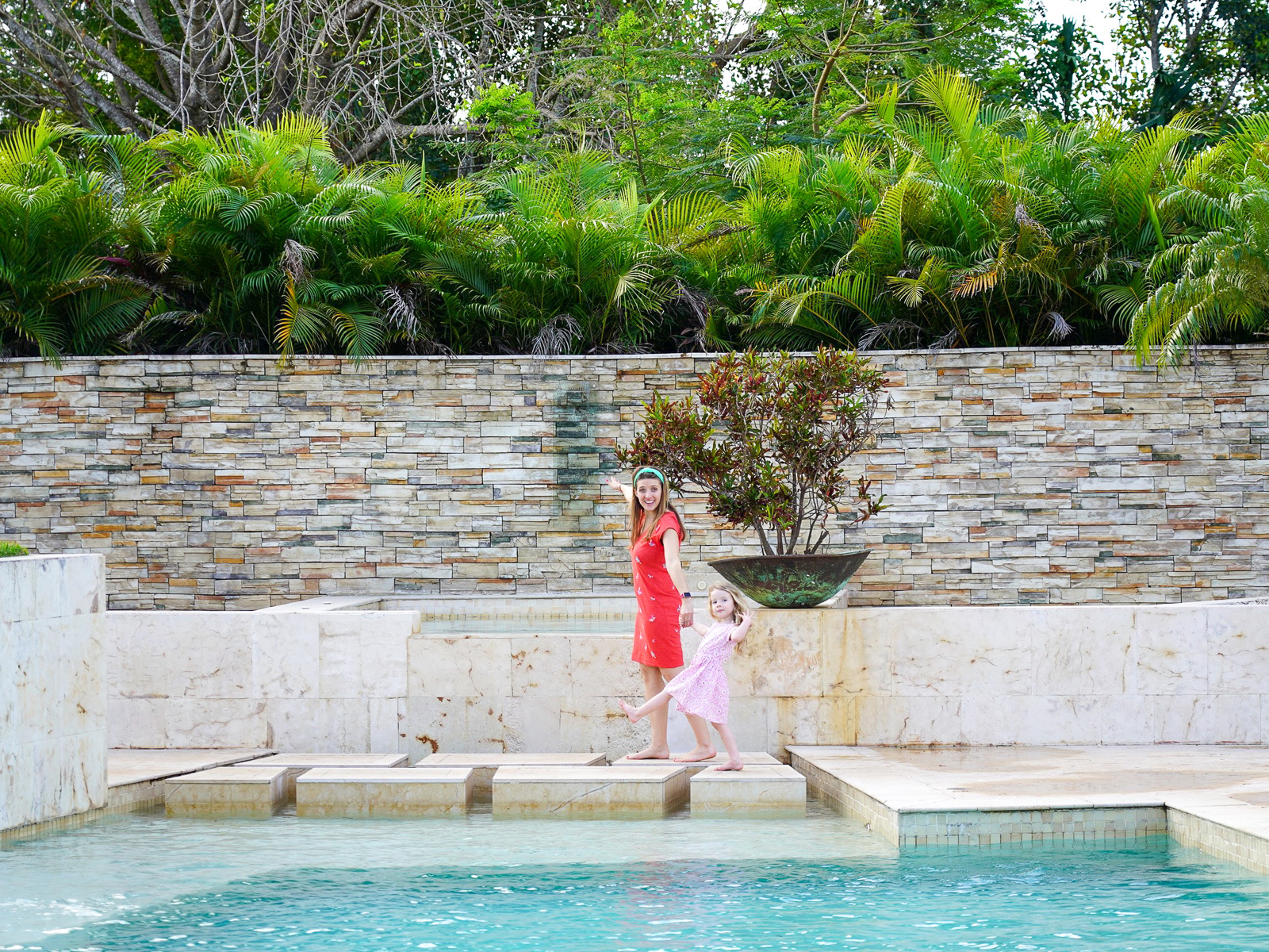 mom and daughter casa del lago pool - Rosewood Mayakoba luxury family resort