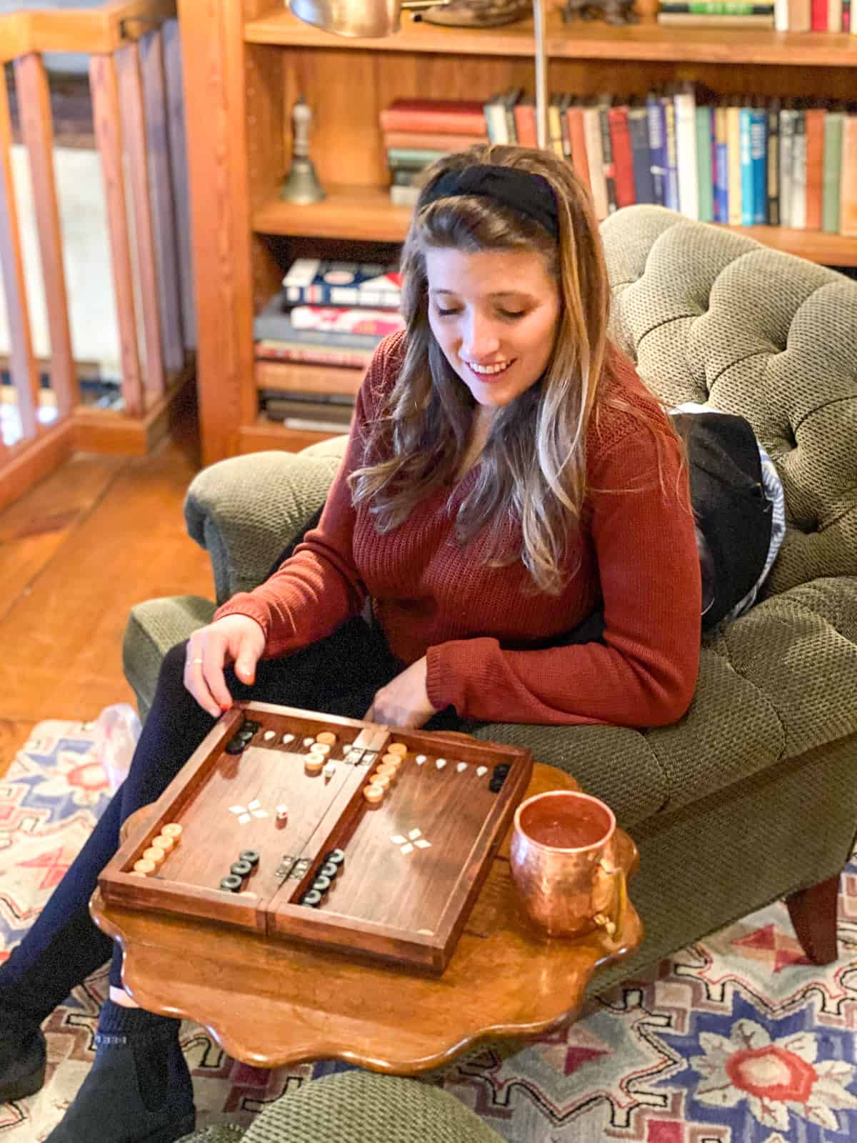 woman playing backgammon twin farms