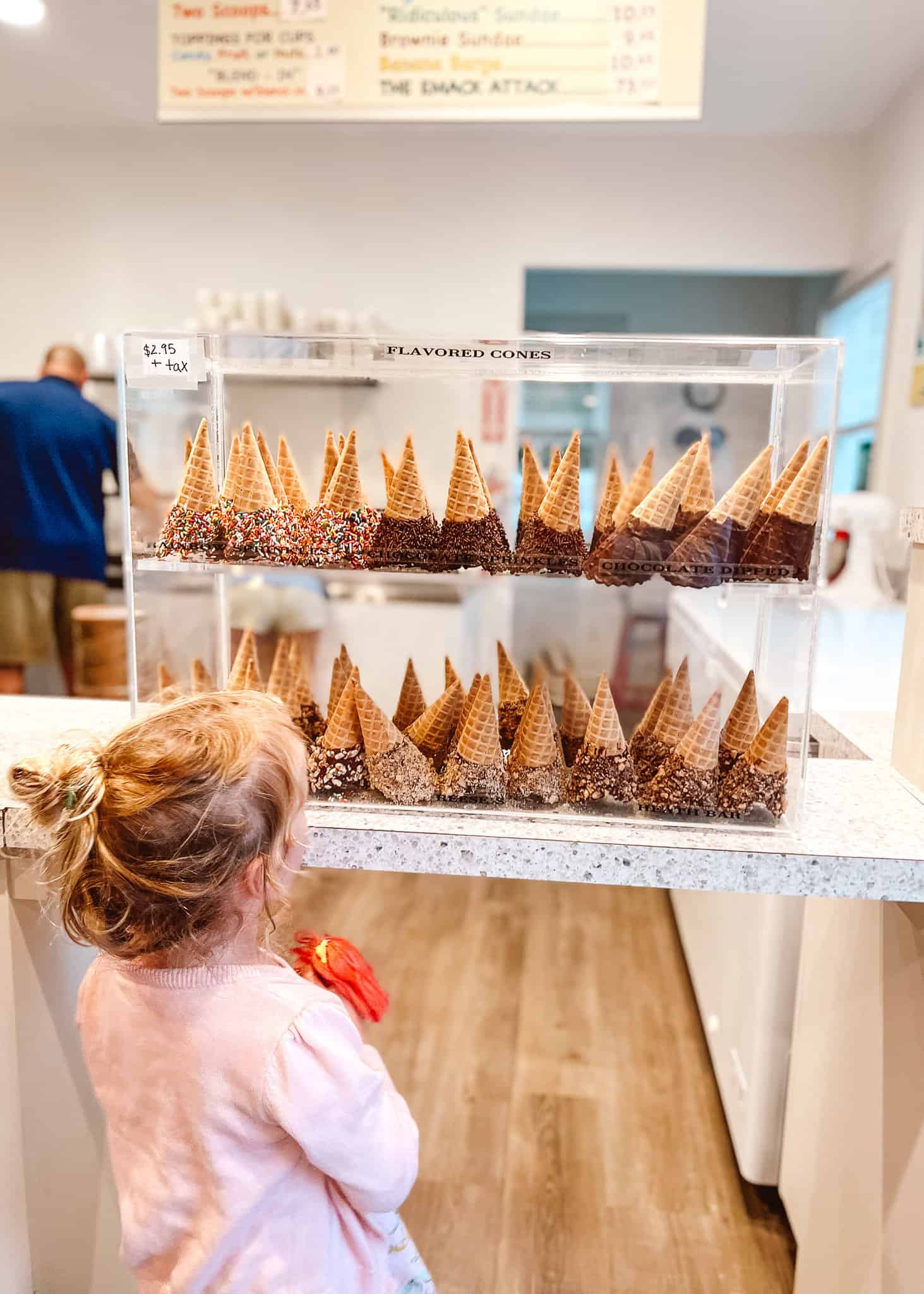 girl looking at ice cream cones - cape cod with kids