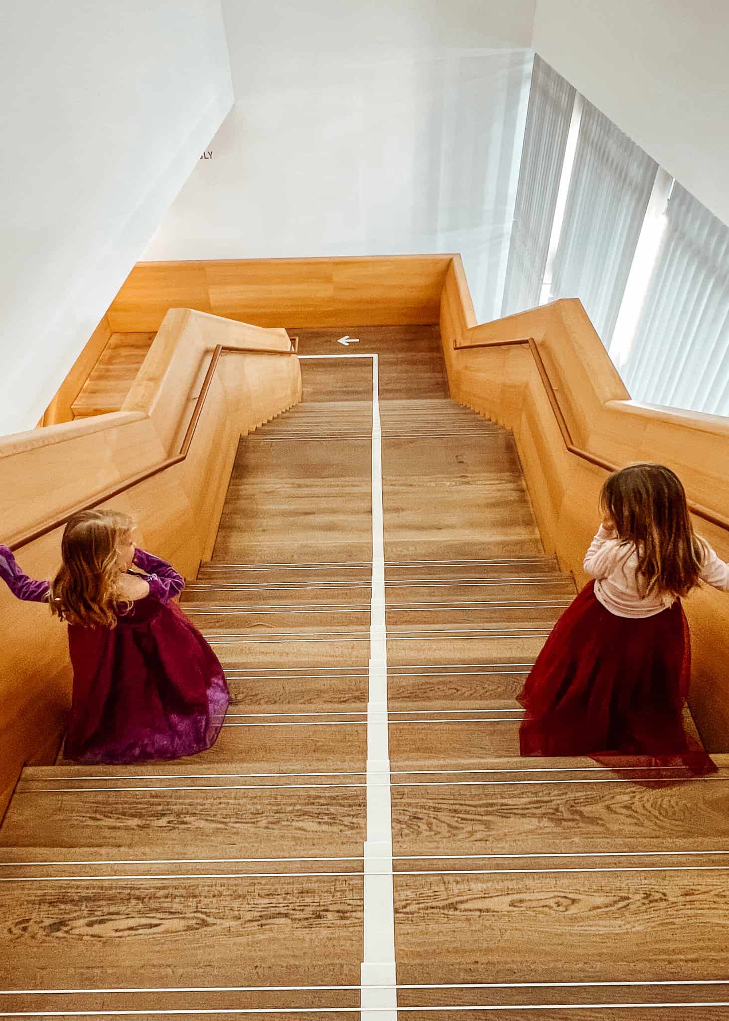 girls on stairs Brandhorst museum - munich with kids