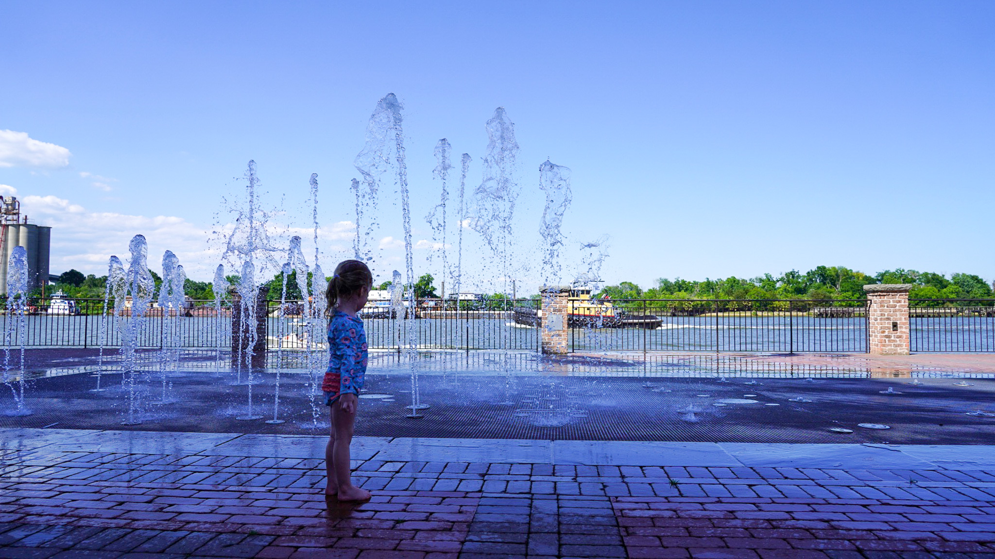 girl in front of fountain savannah
